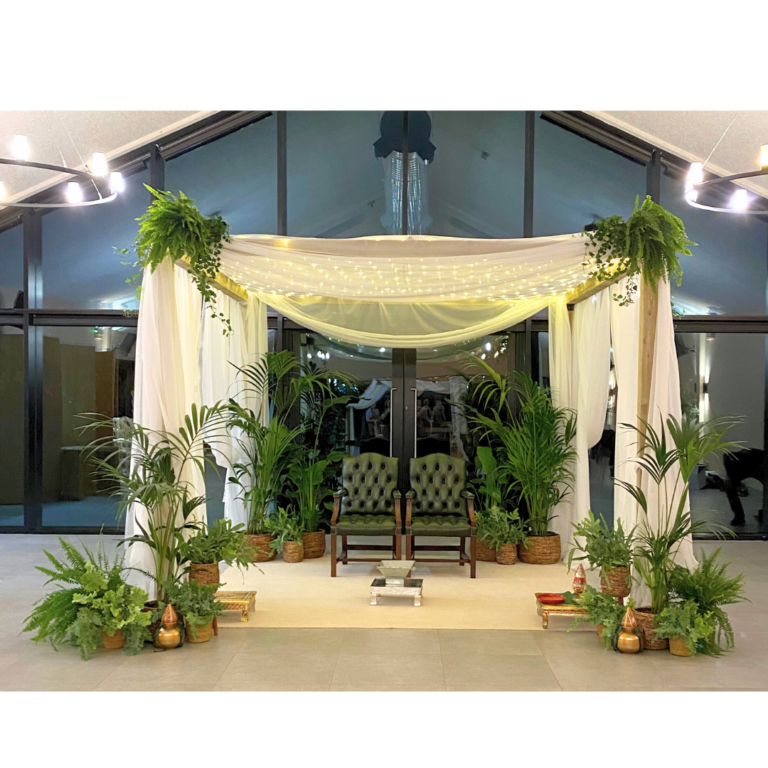 Mandap 16 Botanical wedding mandap hire with white draping, fairy lights and lush greenery, ready for a Hindu ceremony