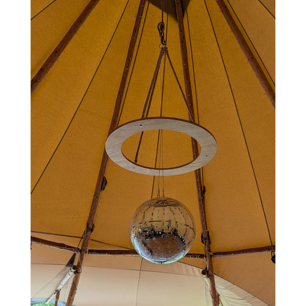 Bespoke wooden ring structure for a living plant chandelier, designed for hanging foliage installations and sustainable wedding décor.